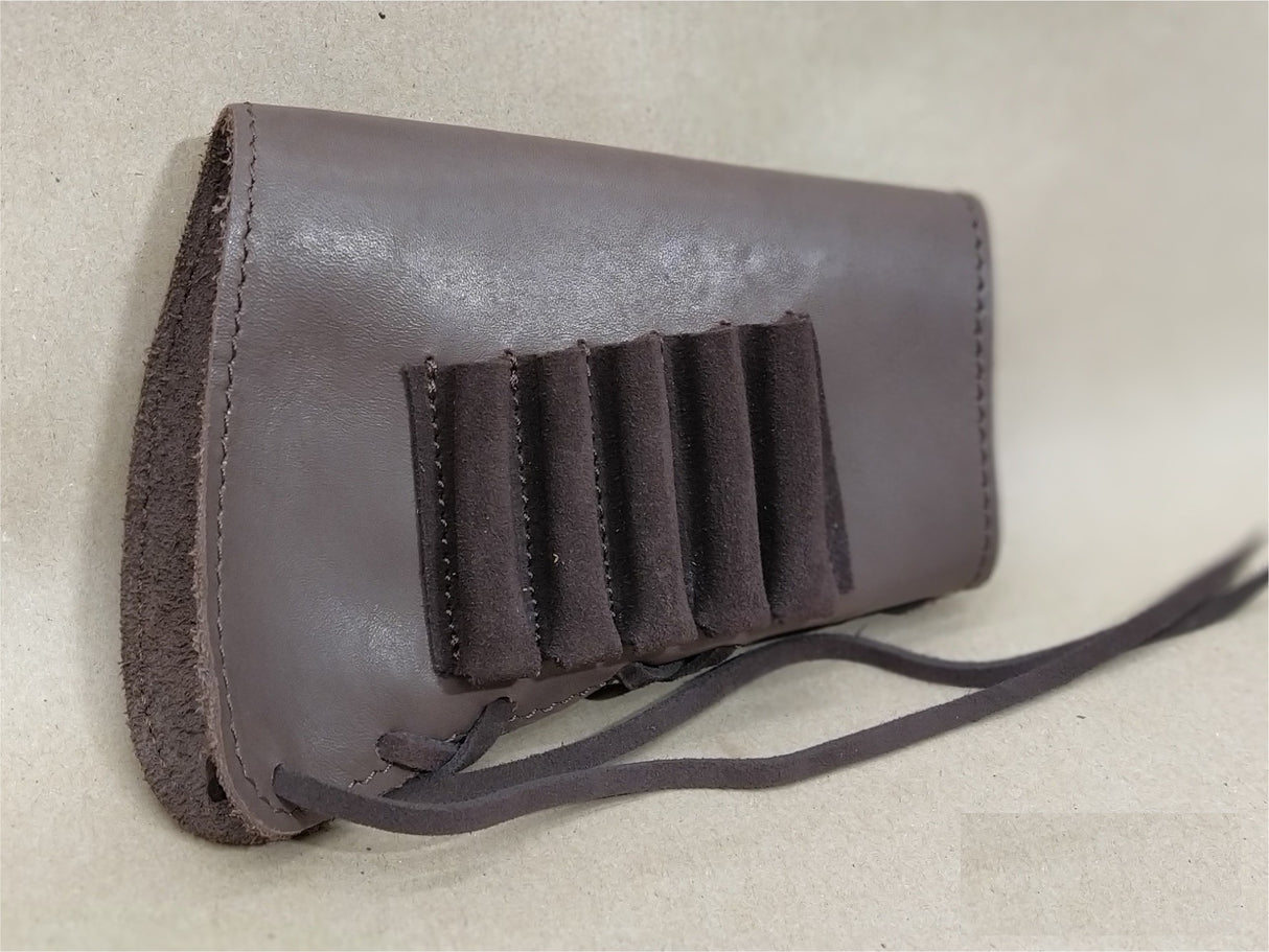 Natural leather cartridge holder on the buttstock for rifle ammunition