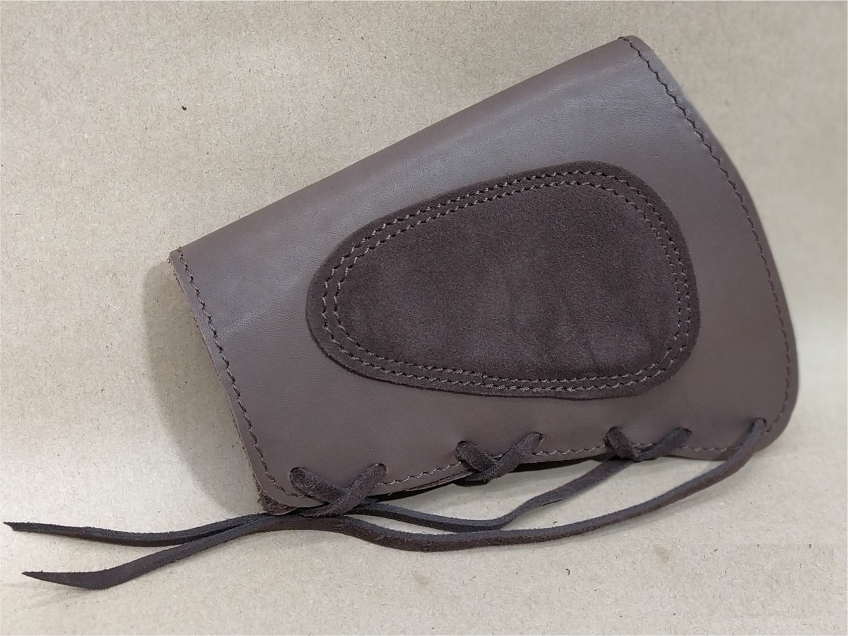 Natural leather cartridge holder on the buttstock for rifle ammunition