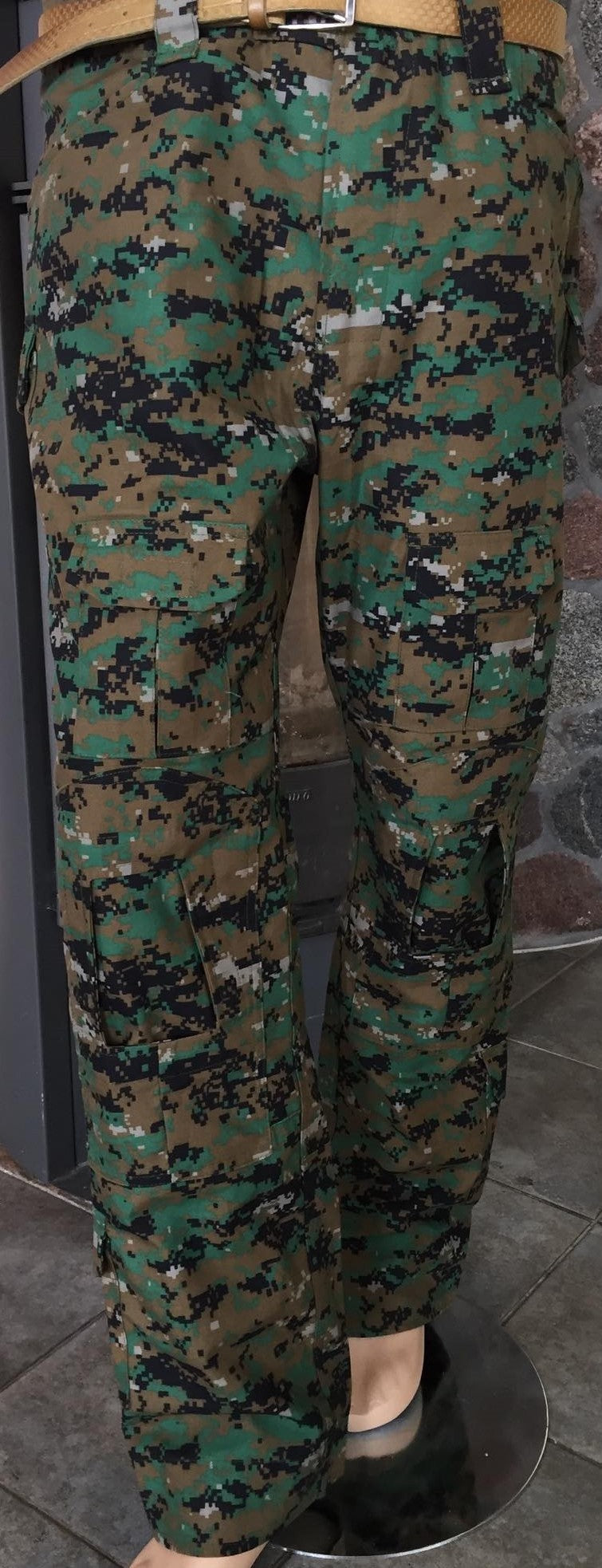 Camouflage trousers with practical pockets