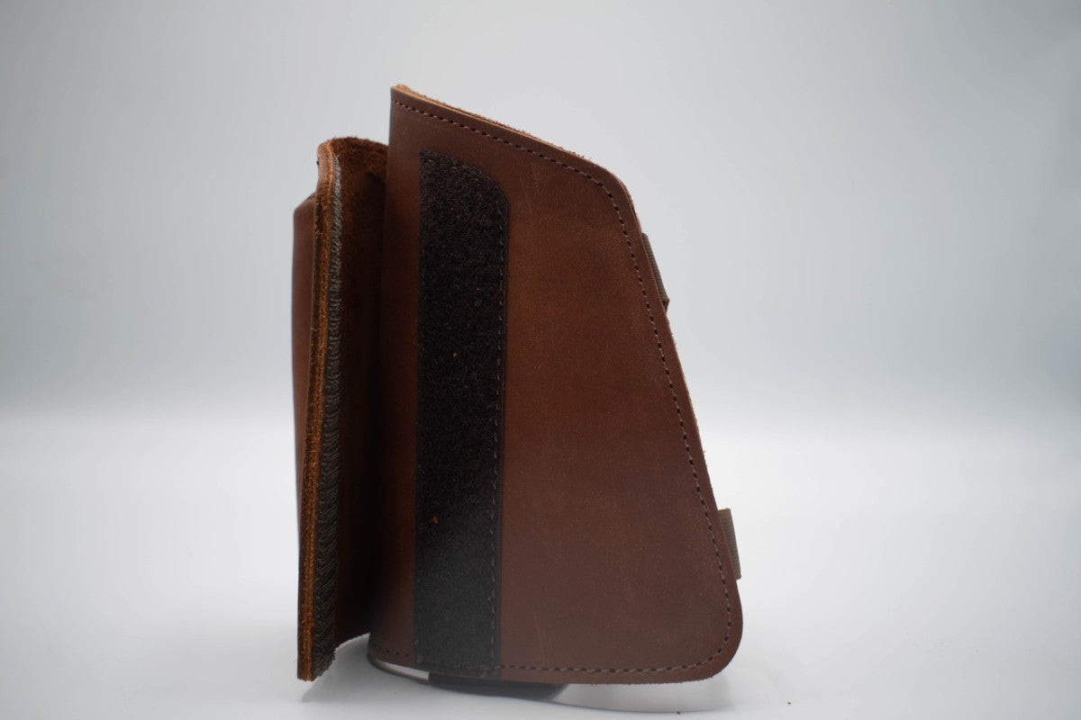 Natural leather rifle stock riser with detachable part
